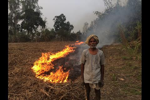 Farmer burning waste
